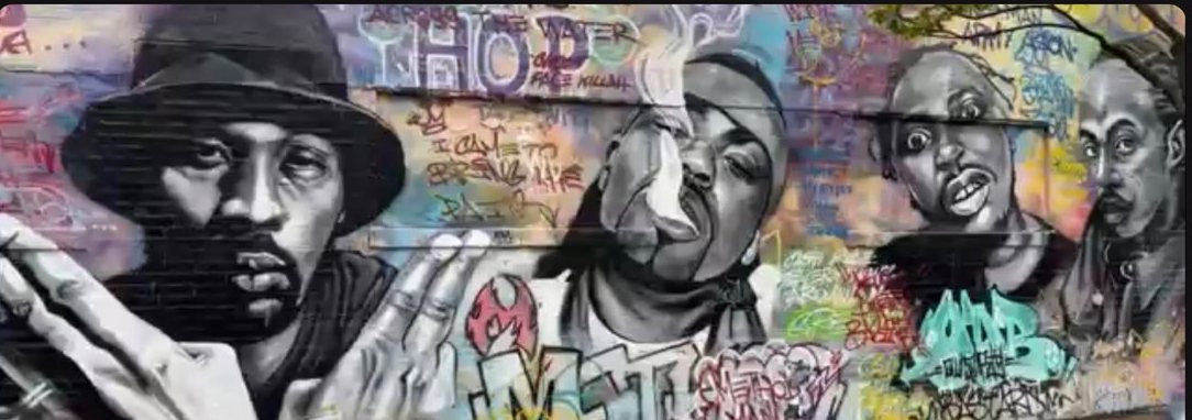 Staten Island hip hop mural with painted portraits and graffiti